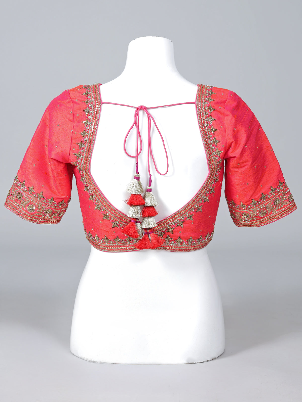 Orange raw silk zardosi embellished V neck blouse