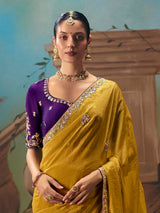 Mustard yellow silk embellished saree