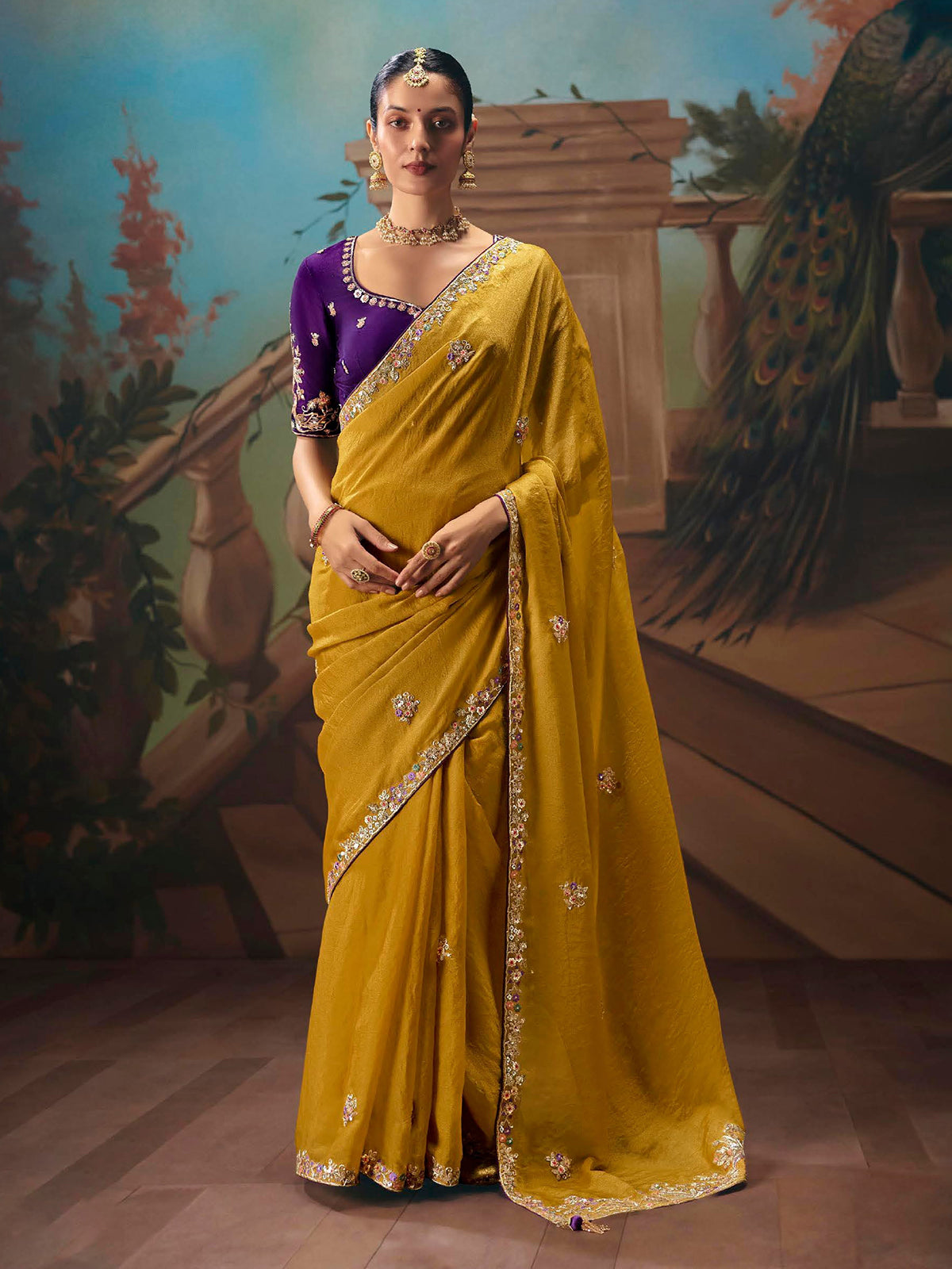 Mustard yellow silk embellished saree