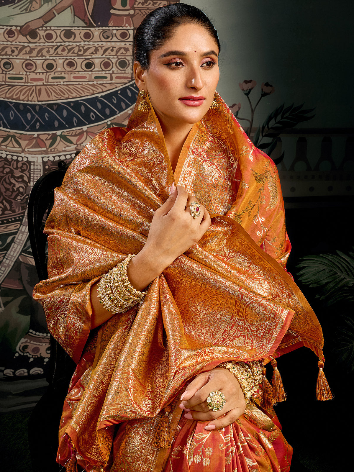 Orange zari worked silk saree for festival