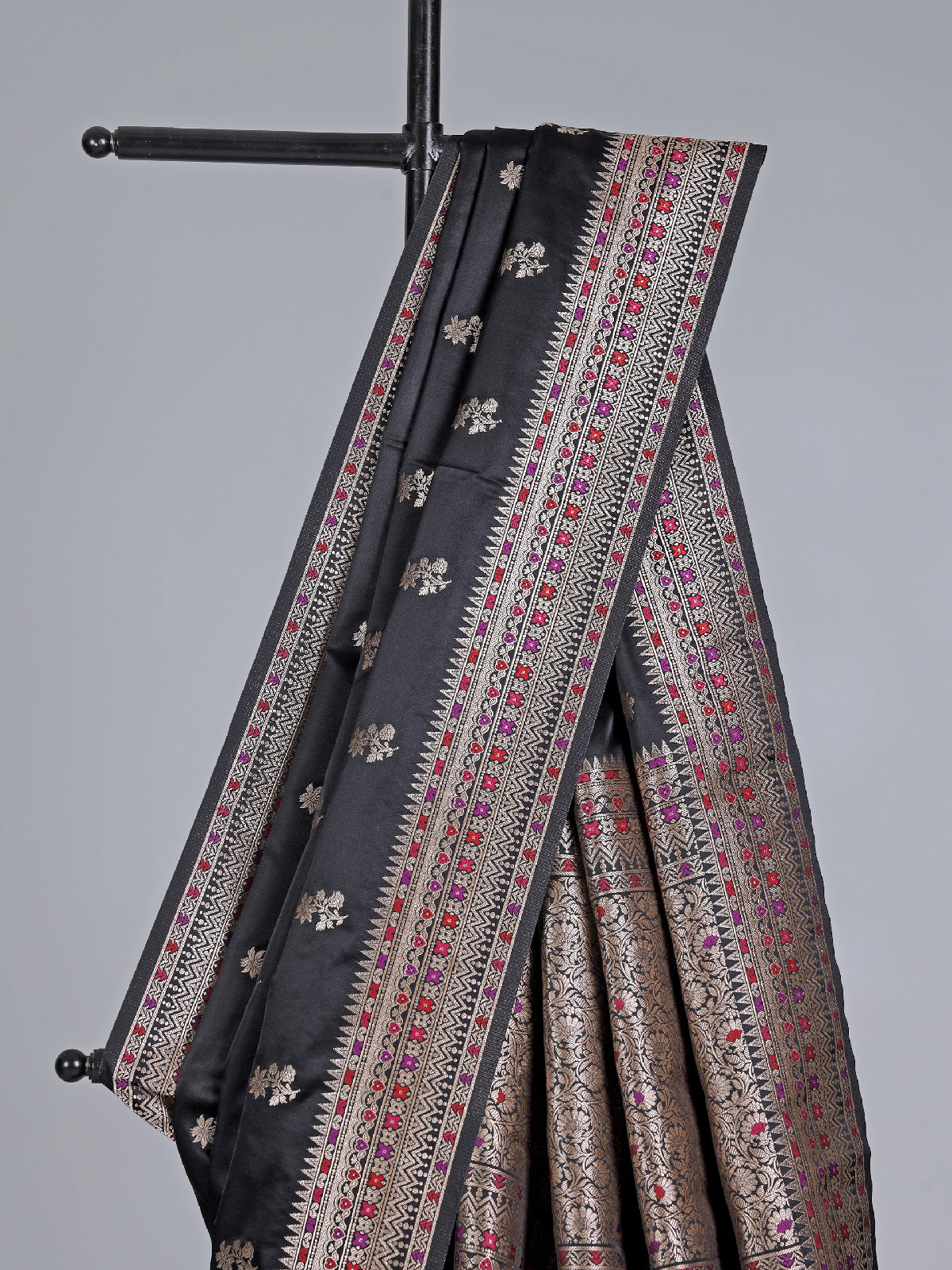Black silk saree with zari and colorful motifs