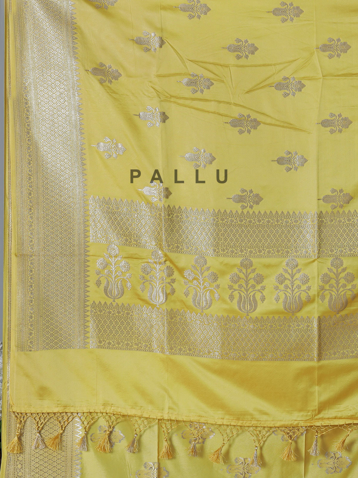 Yellow semi silk saree with classic zari work