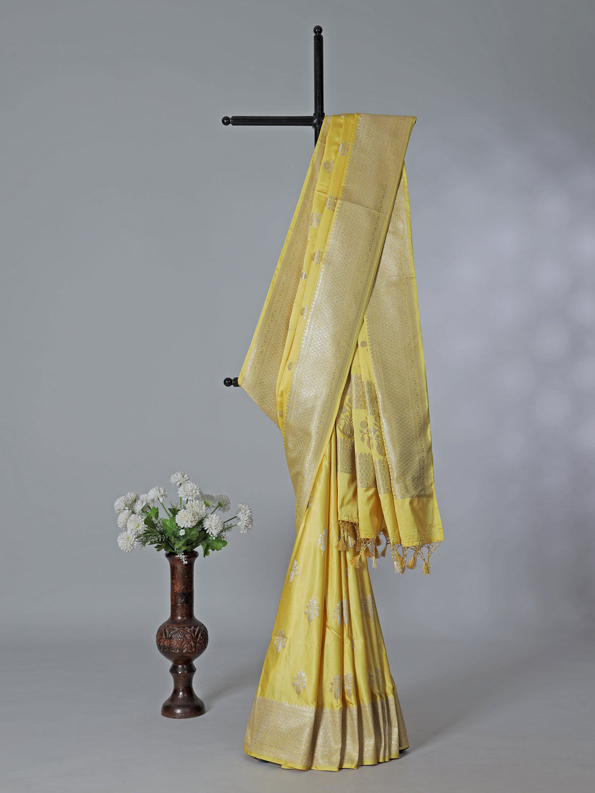 Yellow semi silk saree with classic zari work
