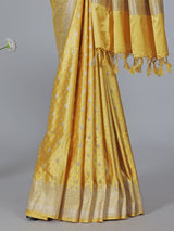 Yellow semi silk saree with festive zari detailing