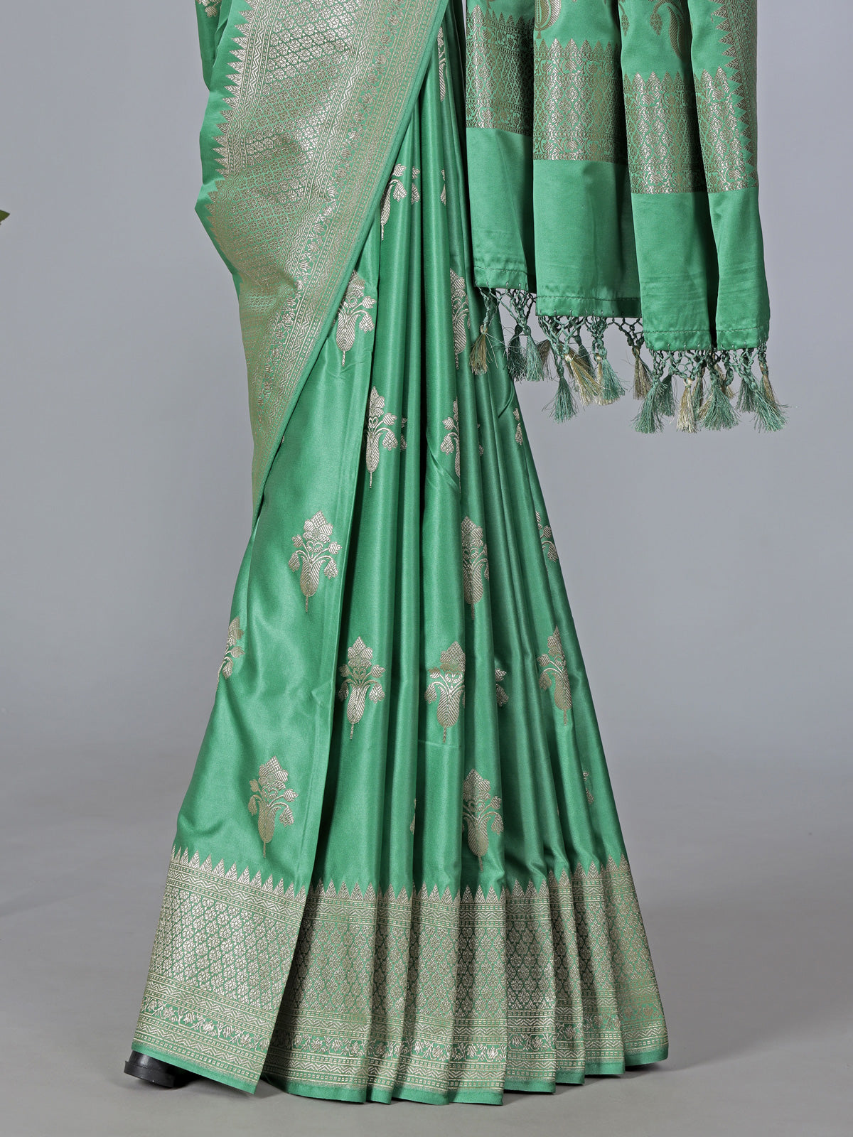 Mint green art silk zari saree with elegant finish