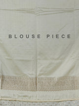 Cream art silk zari embellished traditional wear saree