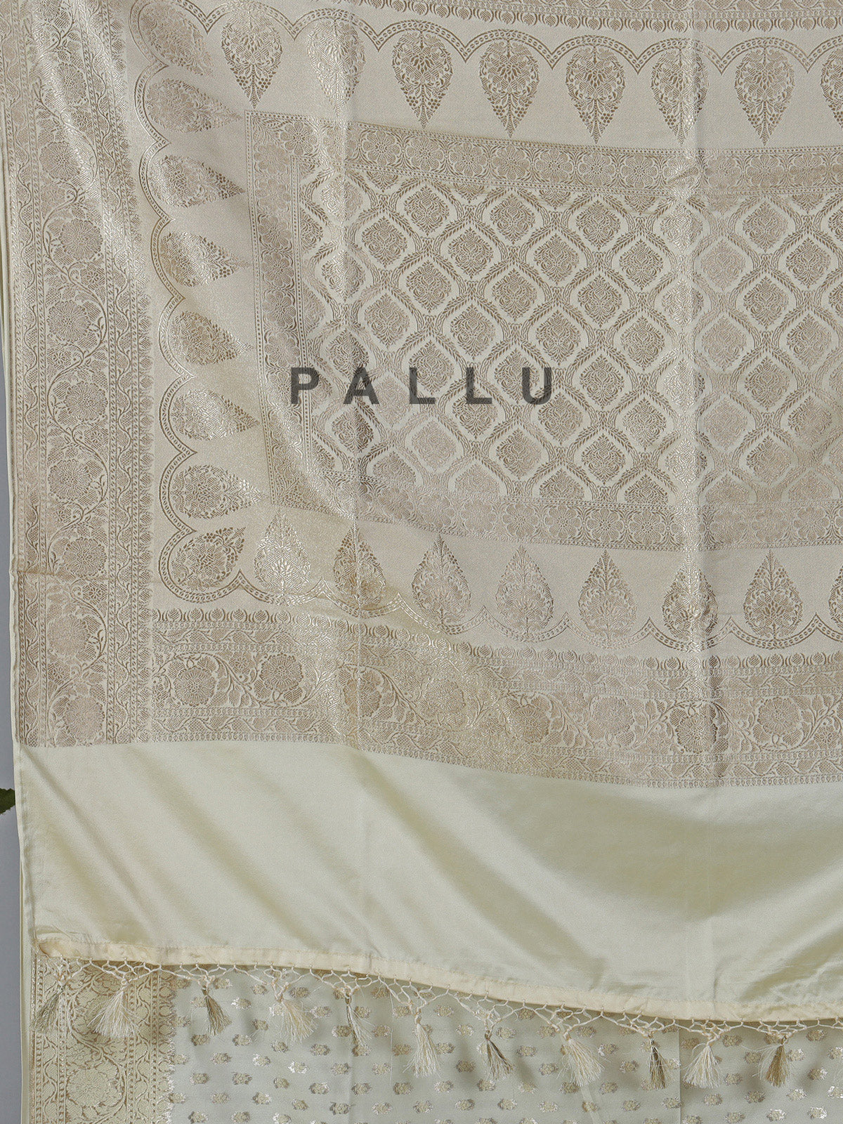 Cream art silk zari embellished traditional wear saree