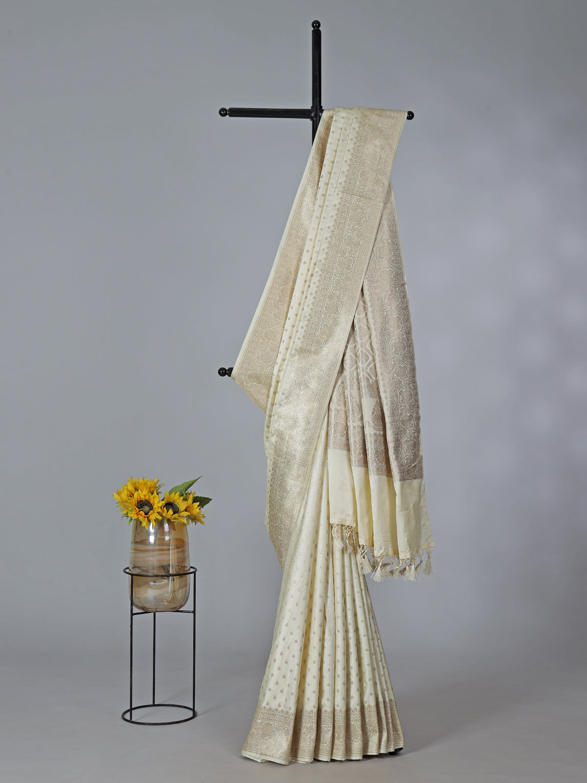 Cream art silk zari embellished traditional wear saree