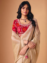 Beige tissue silk reception wear saree