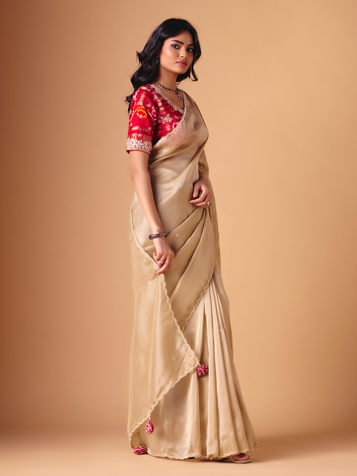 Beige tissue silk reception wear saree