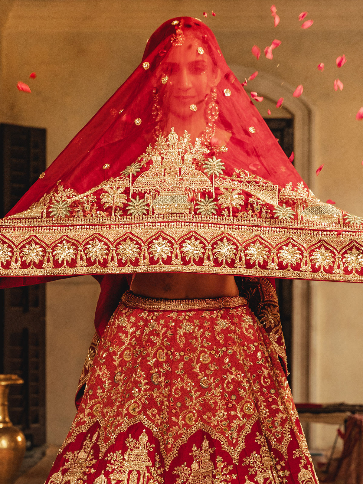 Red raw silk lehenga choli with rich work