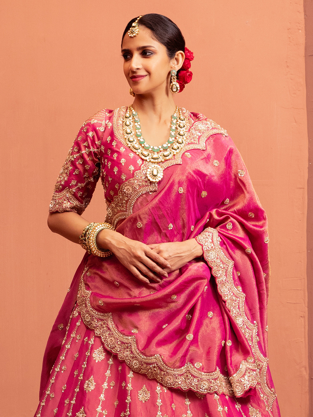 Pink raw silk lehenga choli with embellishments