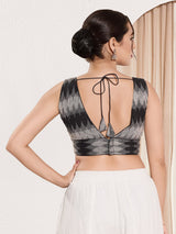 Black printed ikat silk sleeveless blouse