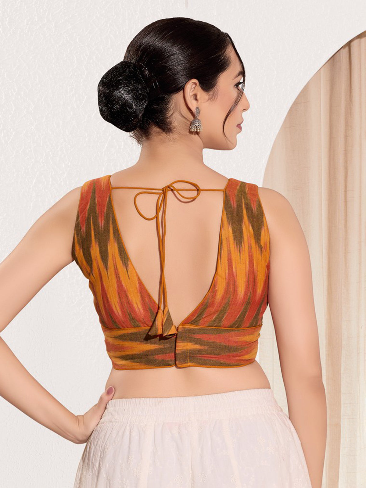 Mustard yellow ikat silk V neck blouse