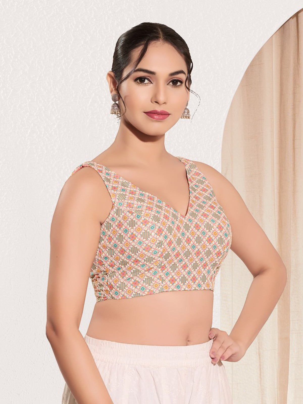 Peach printed jacquard sleeveless blouse