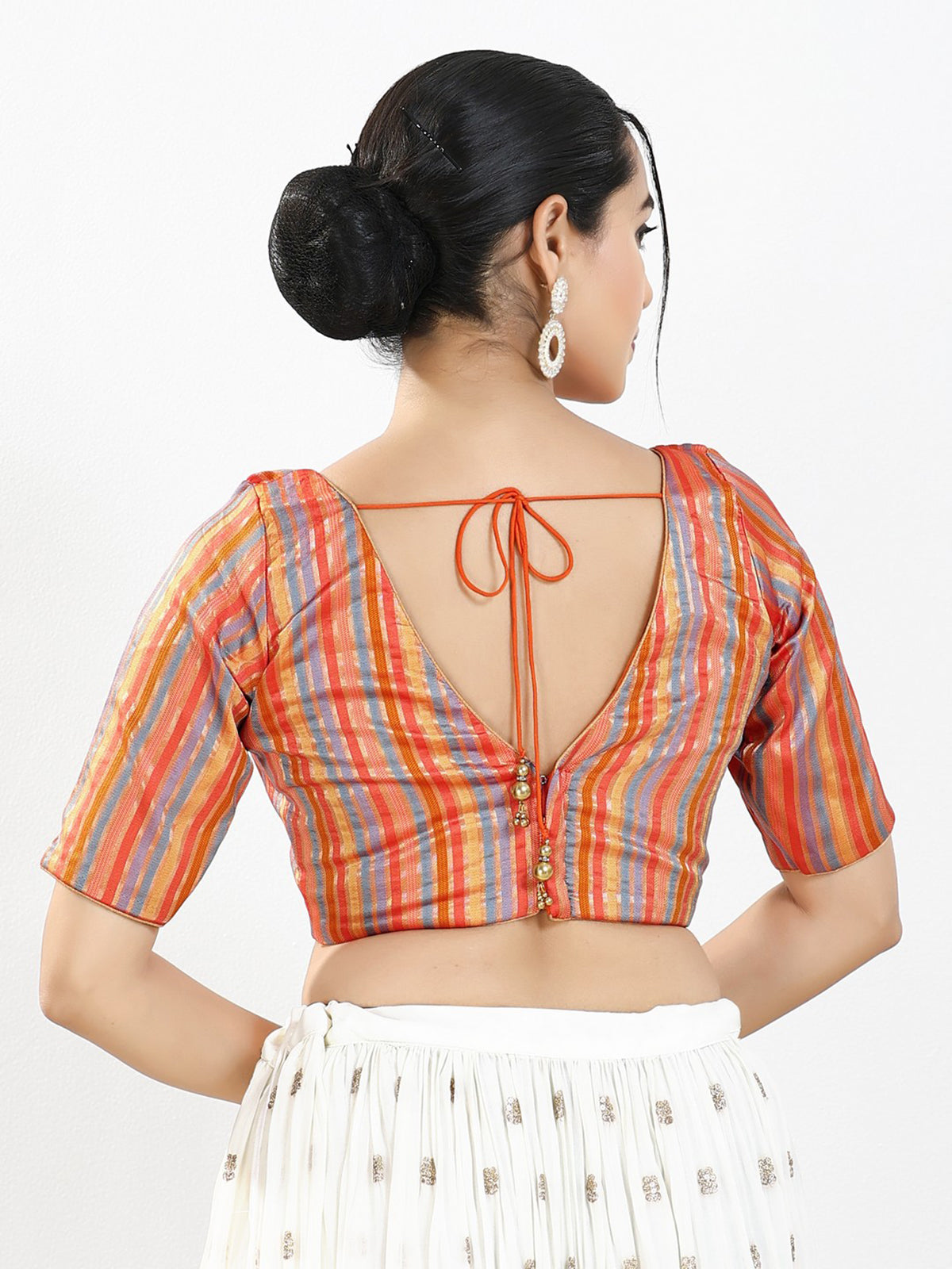 Orange multi stripe brocade V neck blouse