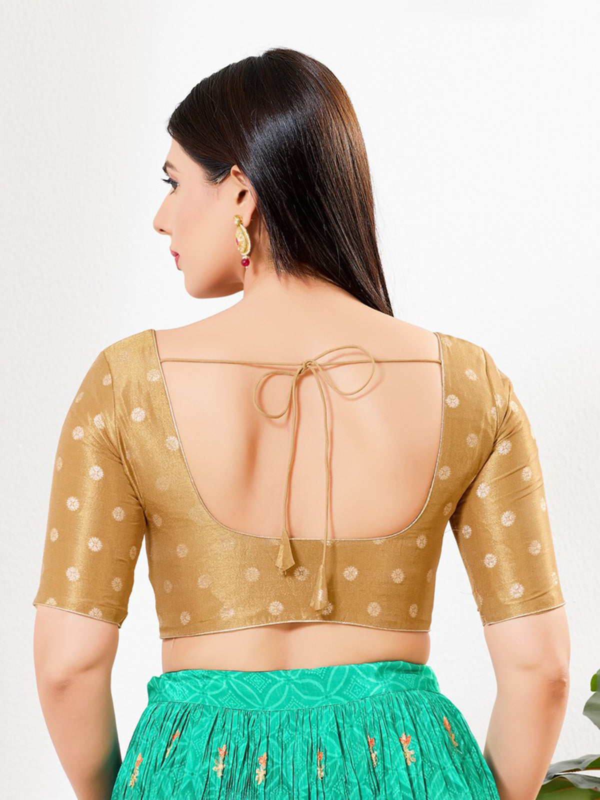 Light gold tissue sleeveless V neck blouse