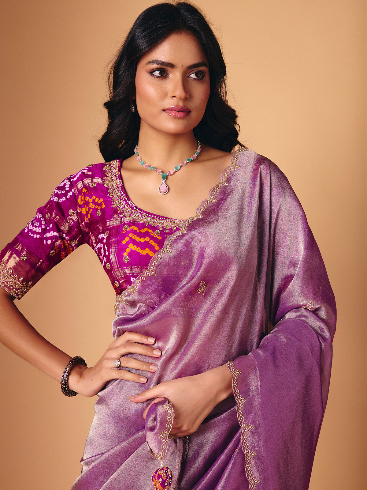 Pastel purple saree in tissue silk with ready made blouse