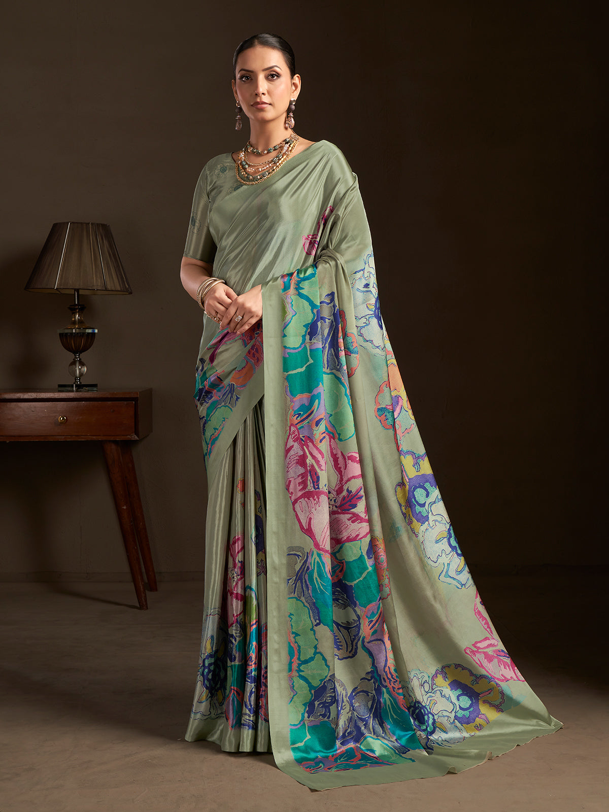 Pastel olive ready to wear silk crepe saree with stitched blouse