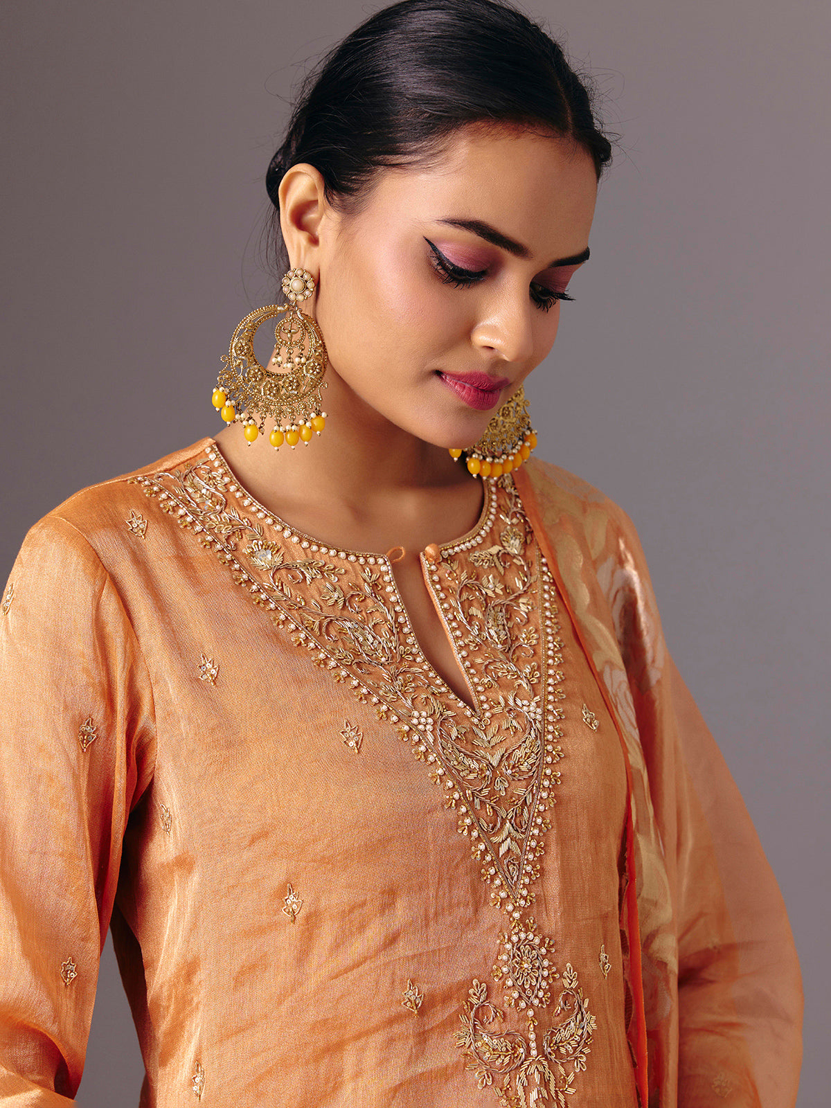 Orange silk full sleeve festive sharara suit