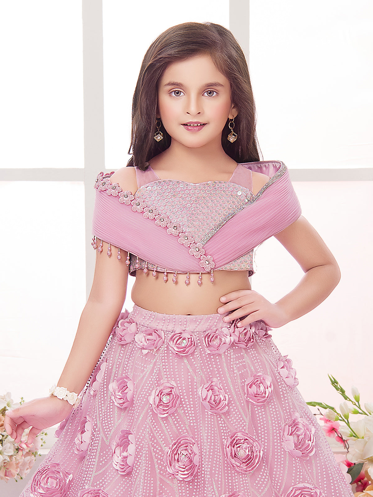 Pink net designer patch work embellished lehenga choli