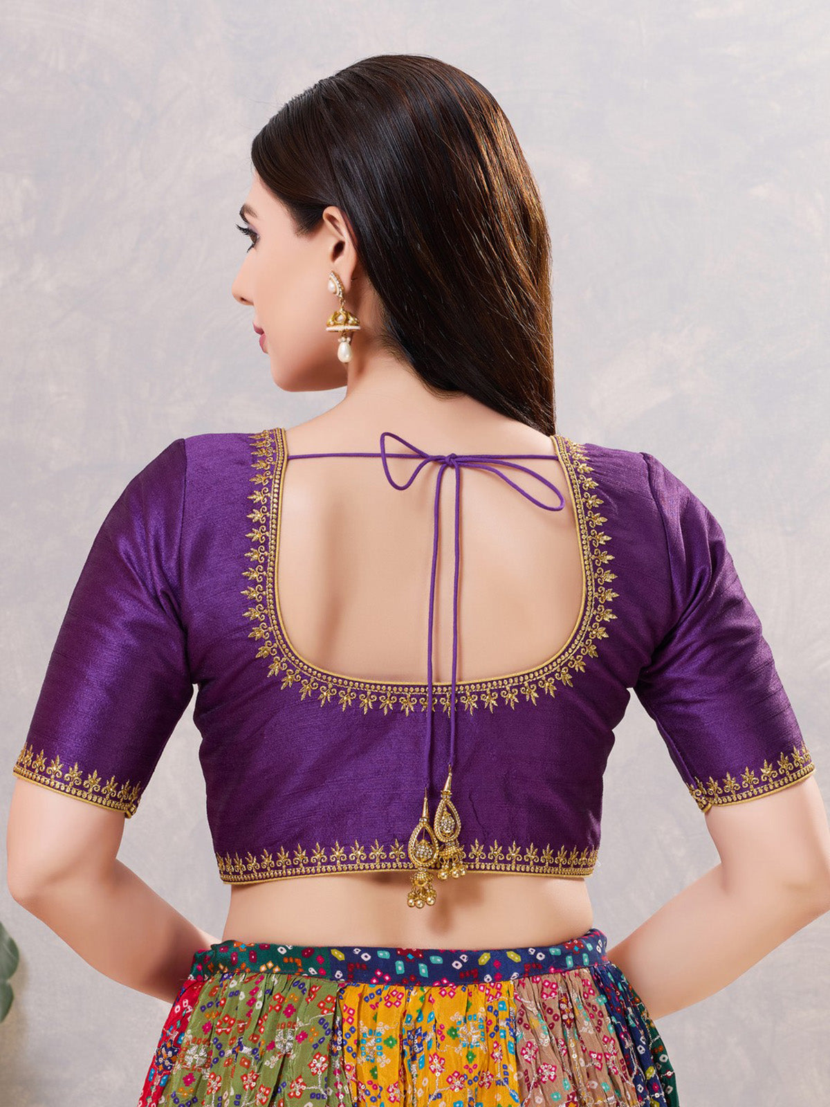 Dark purple silk resham and stone work round neck blouse