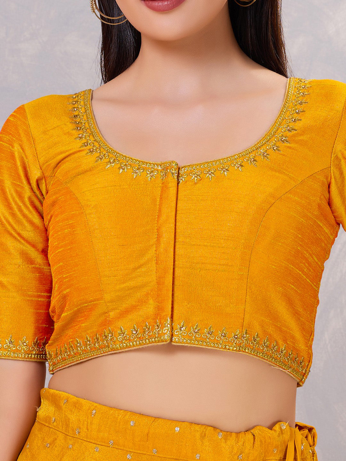 Mustard yellow silk resham and stone work blouse