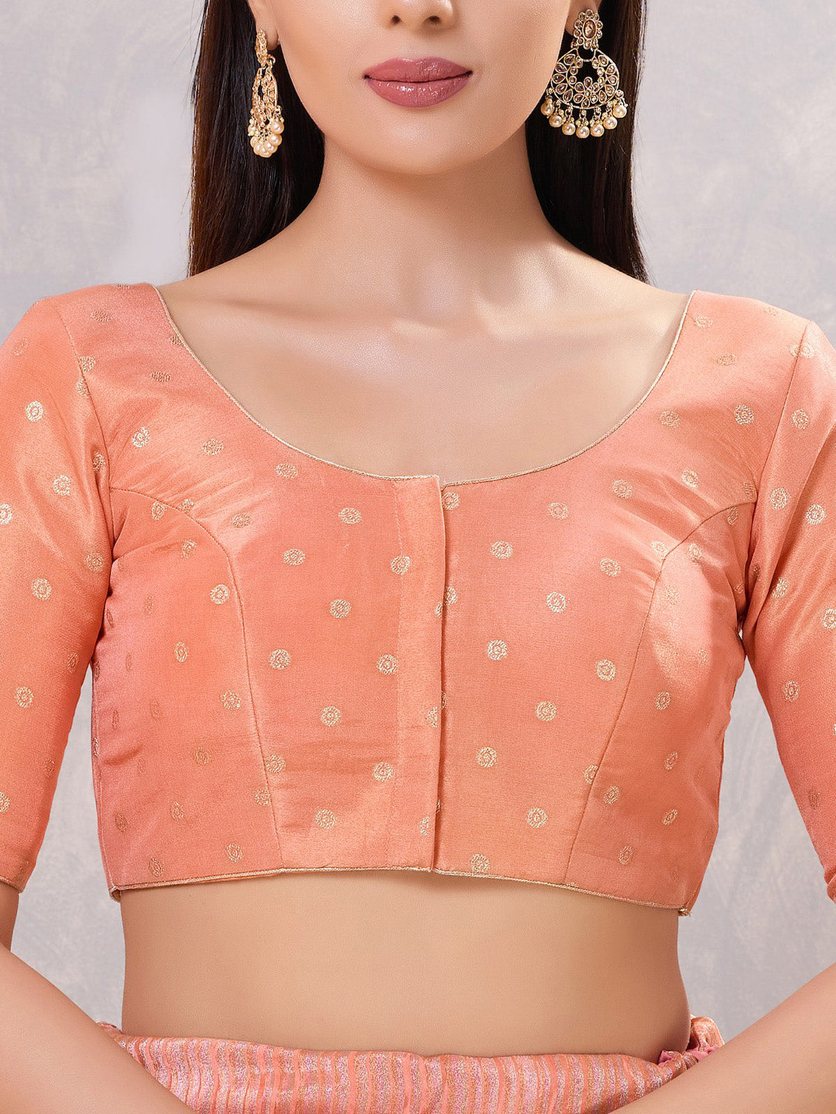Peach silk zari workand round neck blouse
