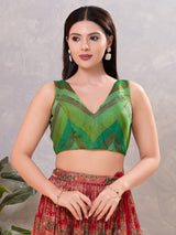 Green multi printed silk sleeveless V neck blouse