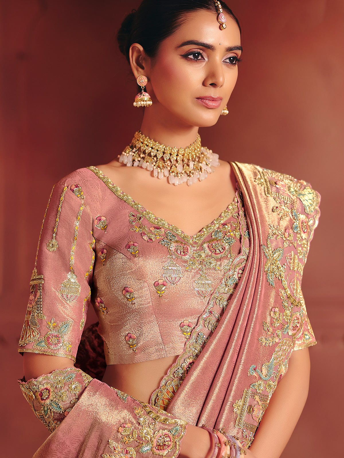 Onion pink wedding saree with ornate handcrafted elegance