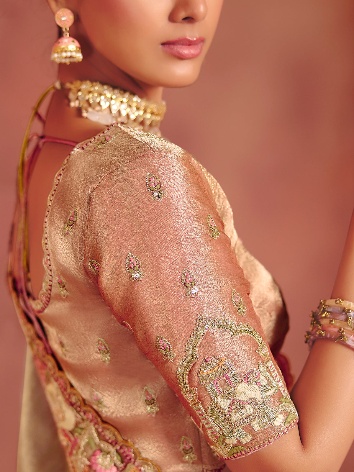 Silver bridal saree enhanced with opulent festive artistry