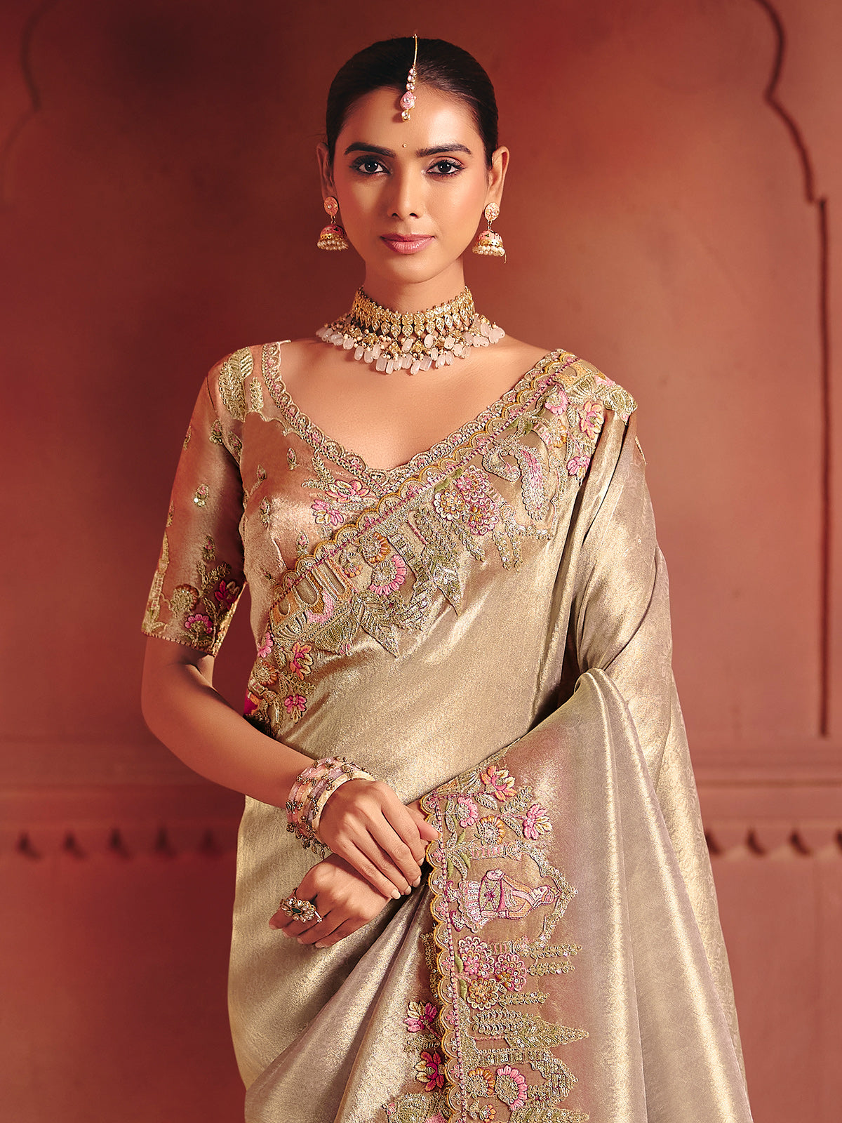 Silver bridal saree enhanced with opulent festive artistry