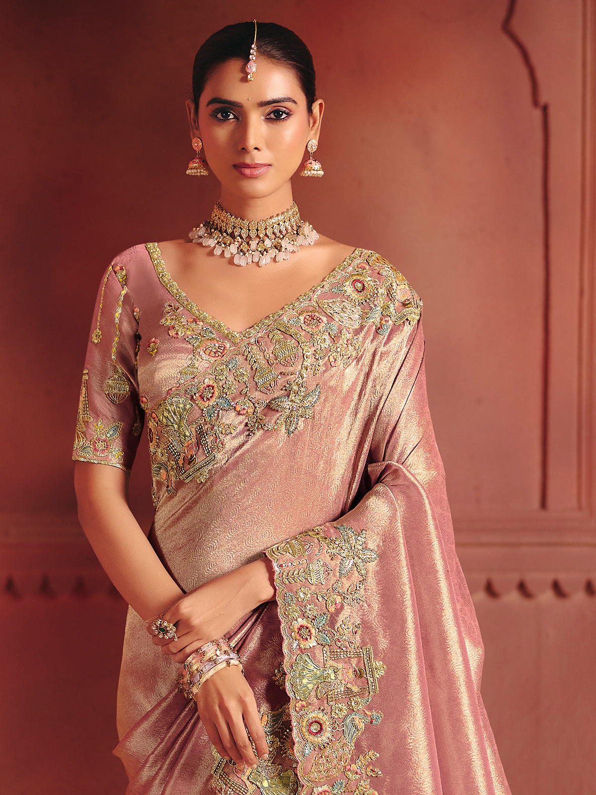 Onion pink wedding saree with ornate handcrafted elegance