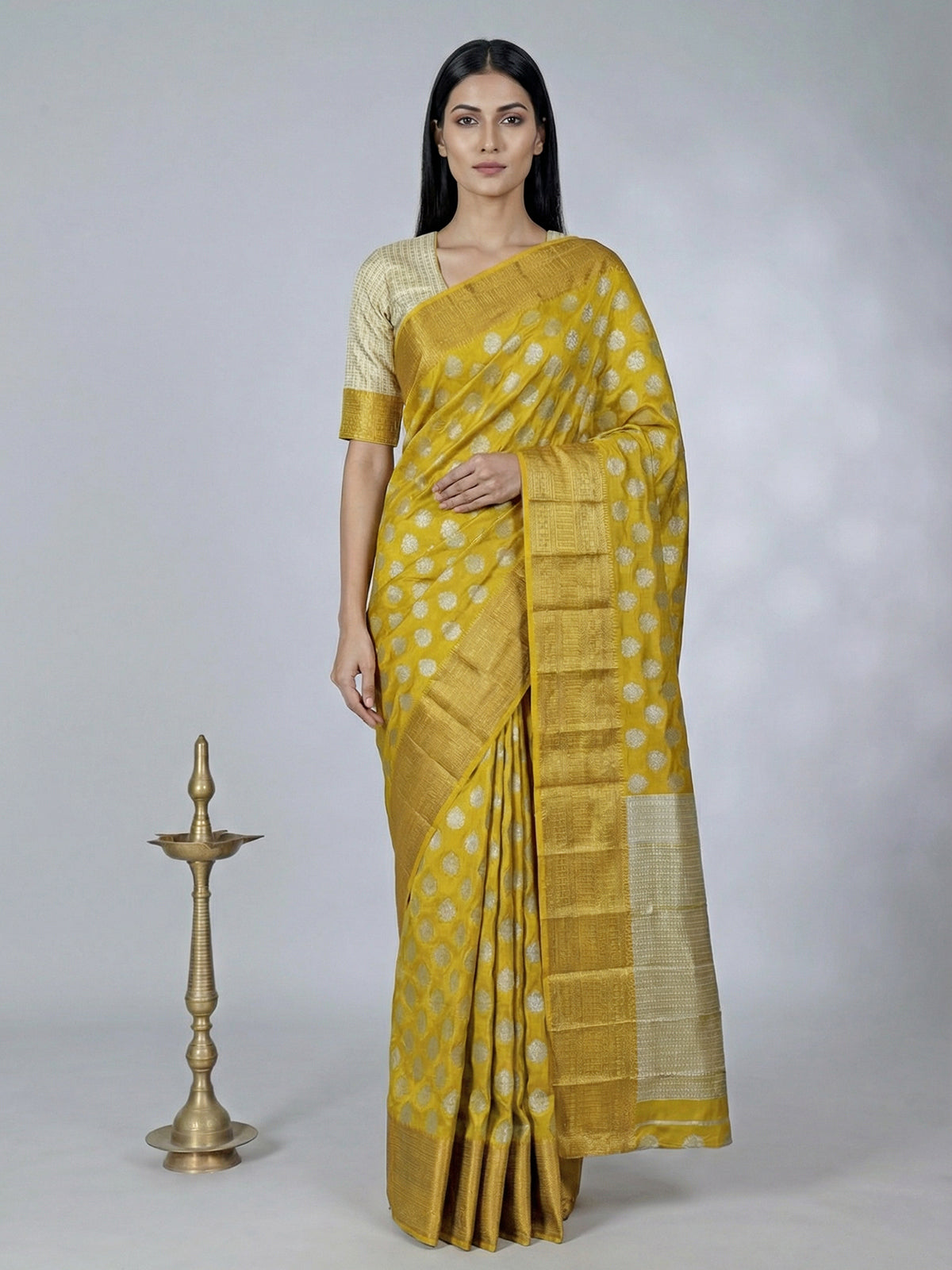 Mustard yellow art silk saree with zari glow
