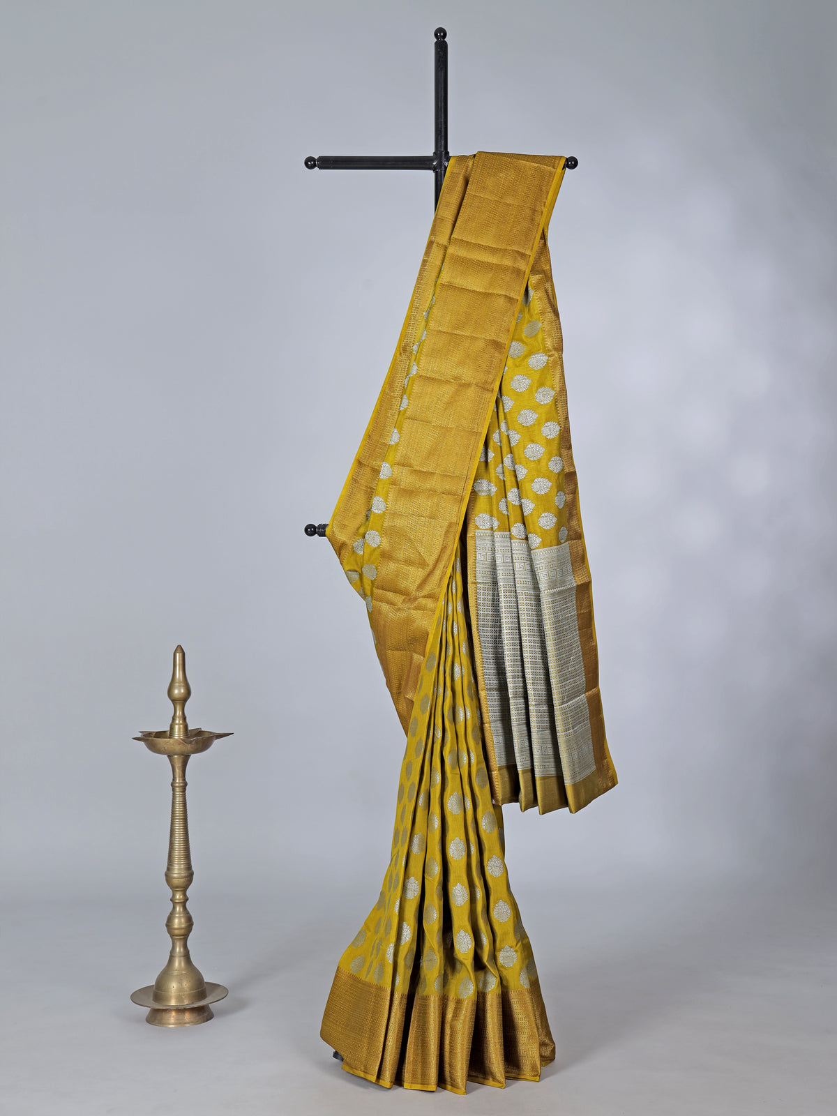 Mustard yellow art silk saree with zari glow