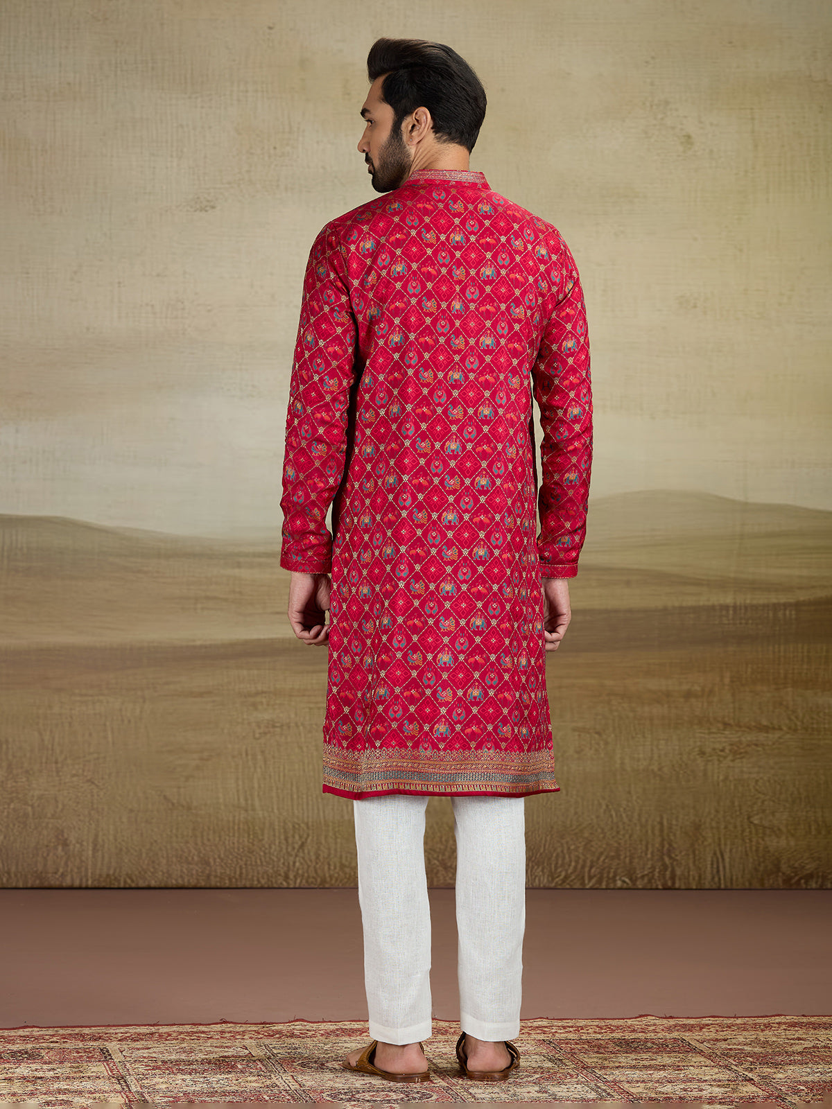Deep red zari worked kurta suit in viscose slk