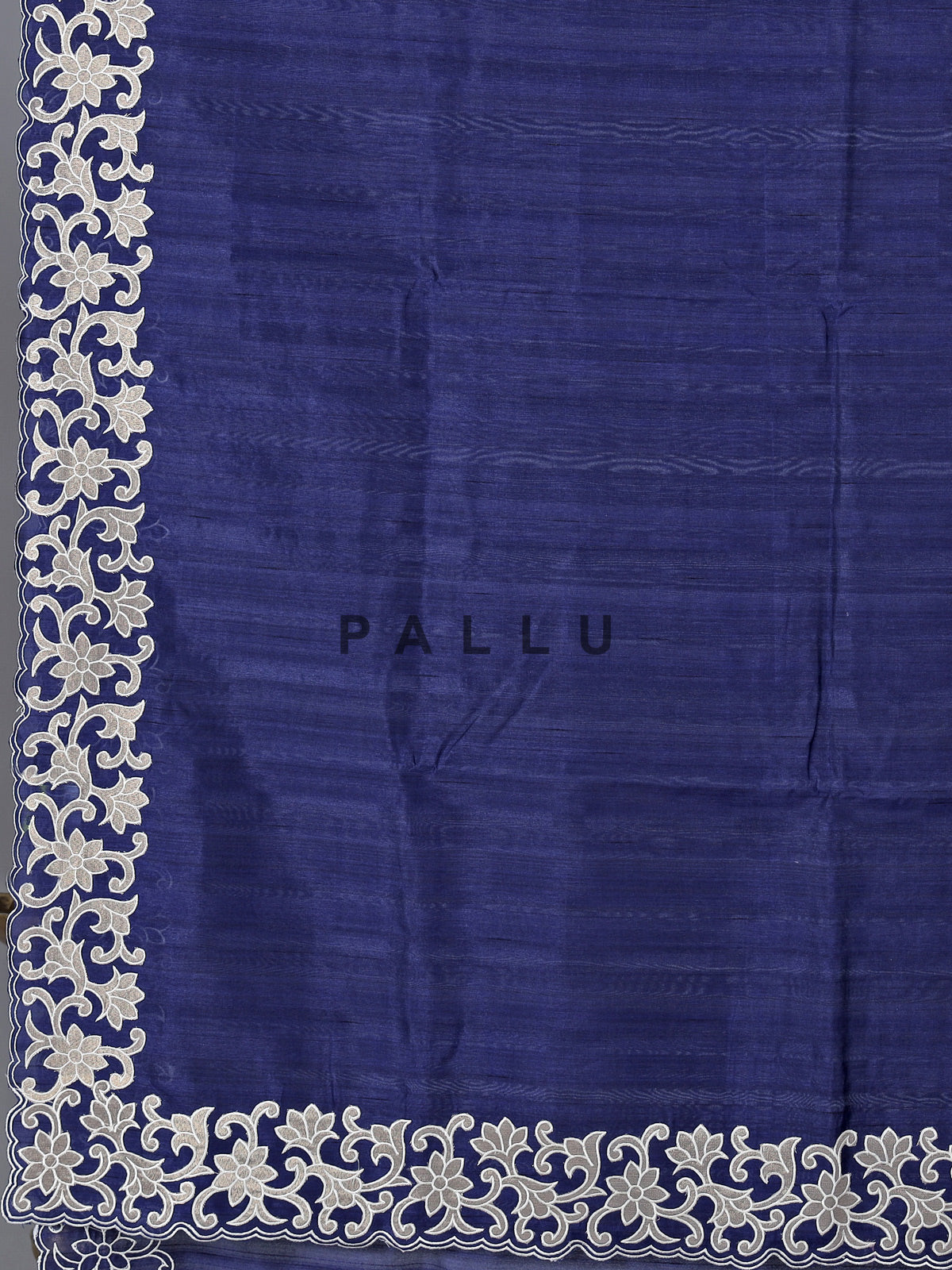 Navy semi tissue silk saree with embroidered border