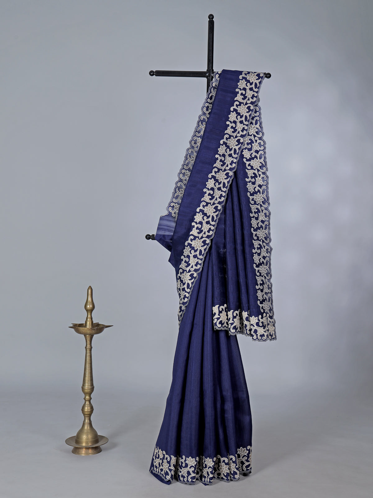 Navy semi tissue silk saree with embroidered border