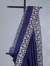Navy semi tissue silk saree with embroidered border