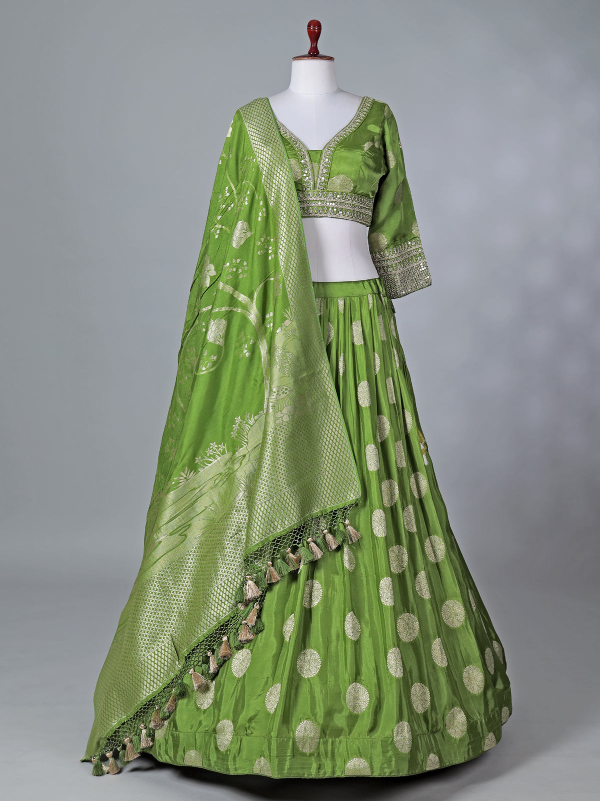 Green wedding wear silk lehenga choli with zari glow