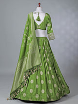 Green wedding wear silk lehenga choli with zari glow