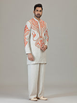 Ivory orange embroidered contemporary celebration look