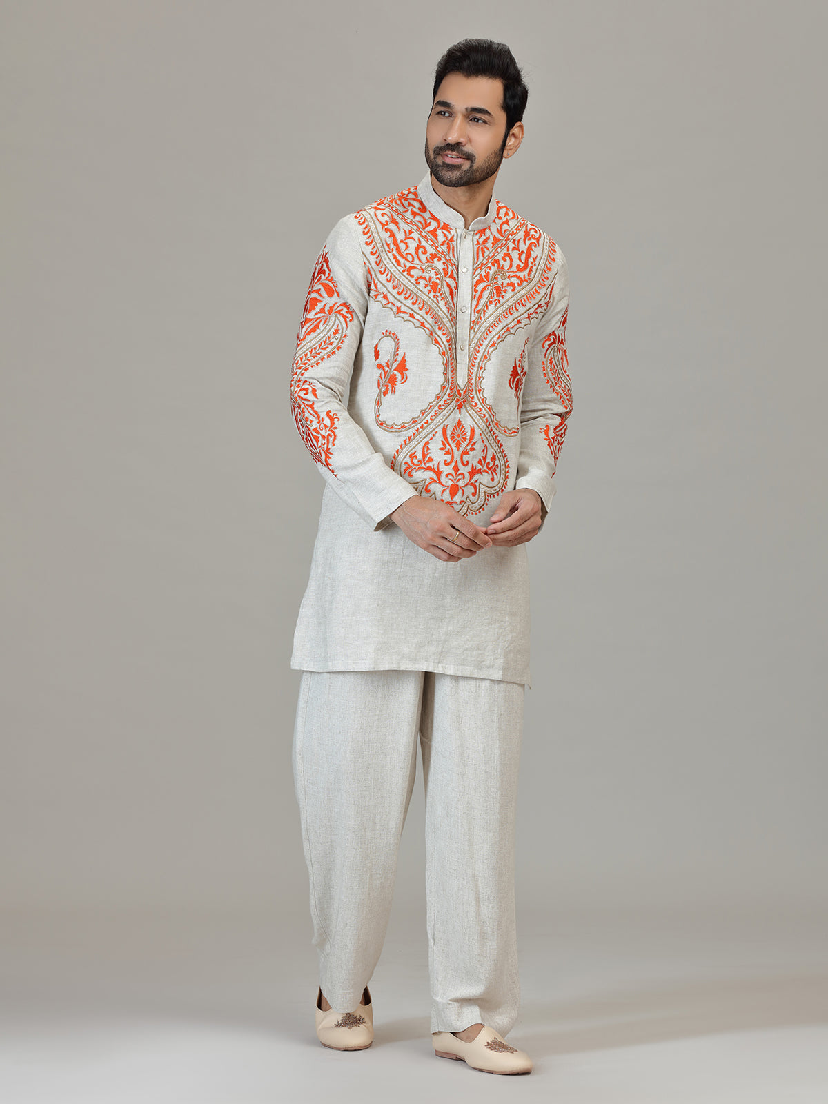 Ivory orange embroidered contemporary celebration look