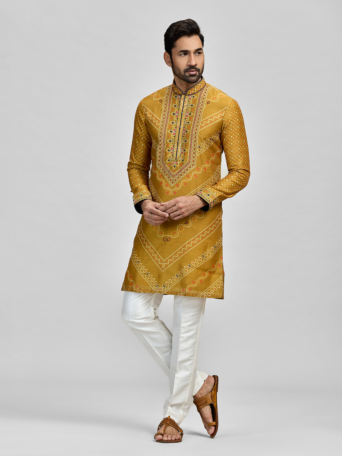 Yellow silk haldi bandhani embroidered kurta ensemble