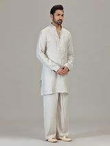 Cream linen resham embellished festive kurta ensemble