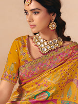 Mustard yellow lotus peacock pattern banarasi silk charm