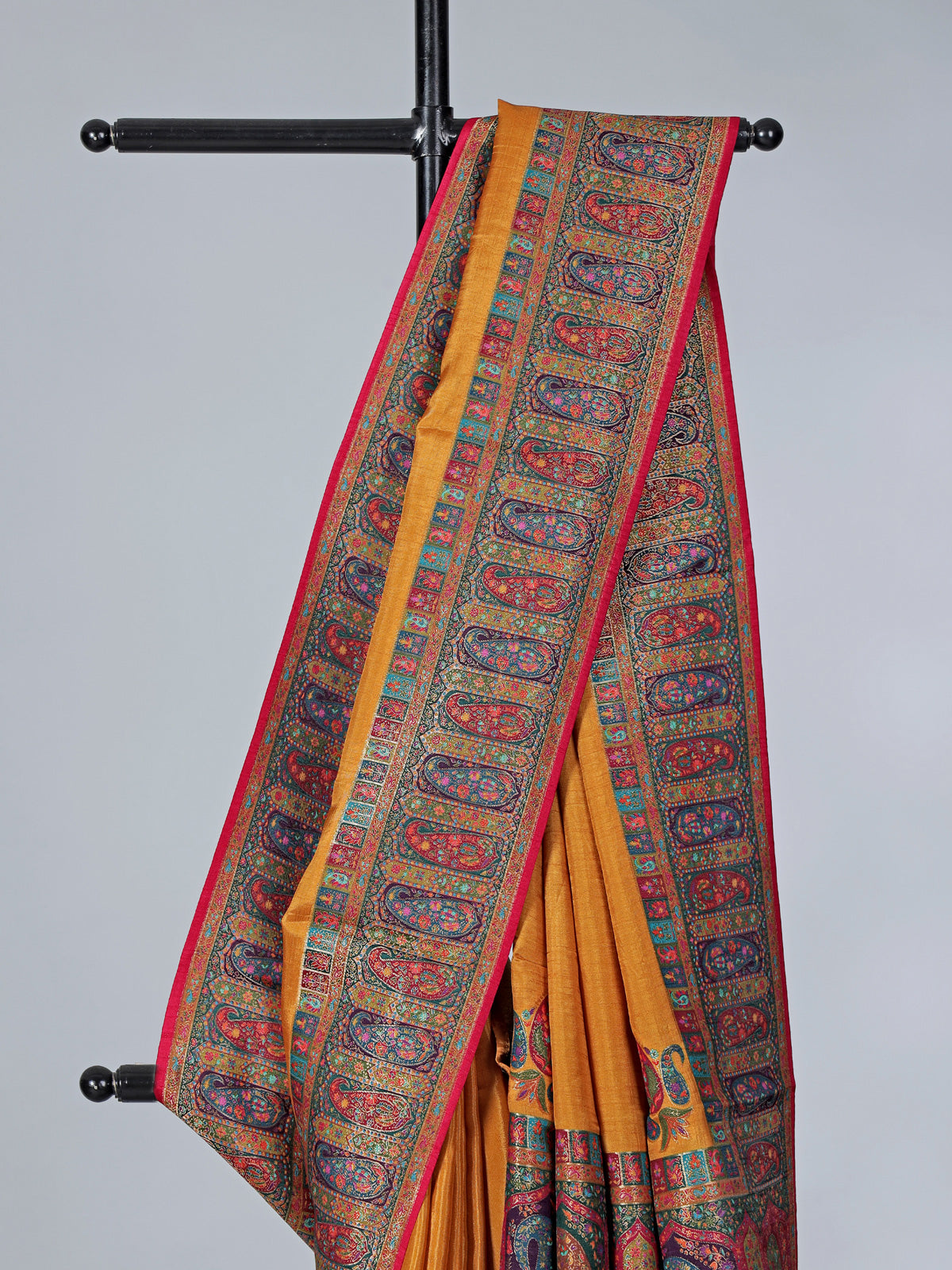 Mustard yellow art pashmina silk saree showcasing timeless embroidery