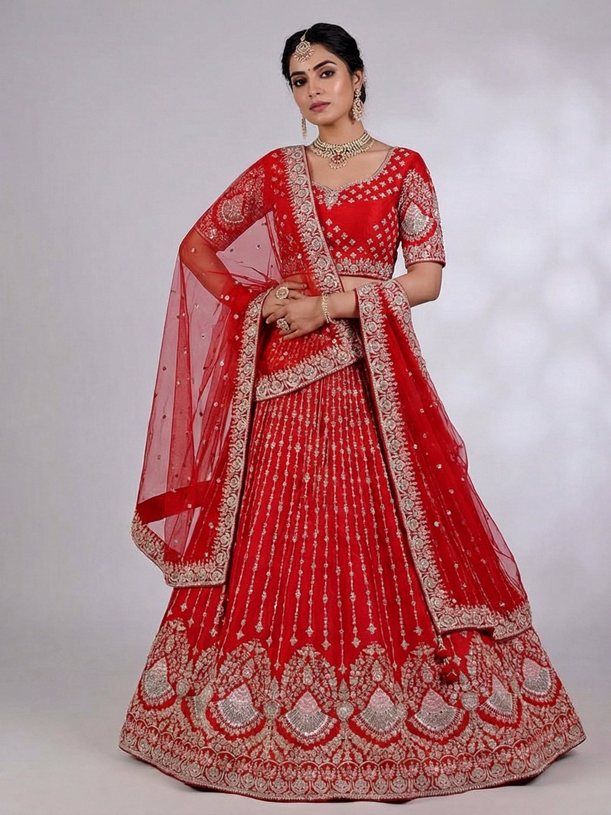 Red raw silk bridal lehenga choli with resham detailing