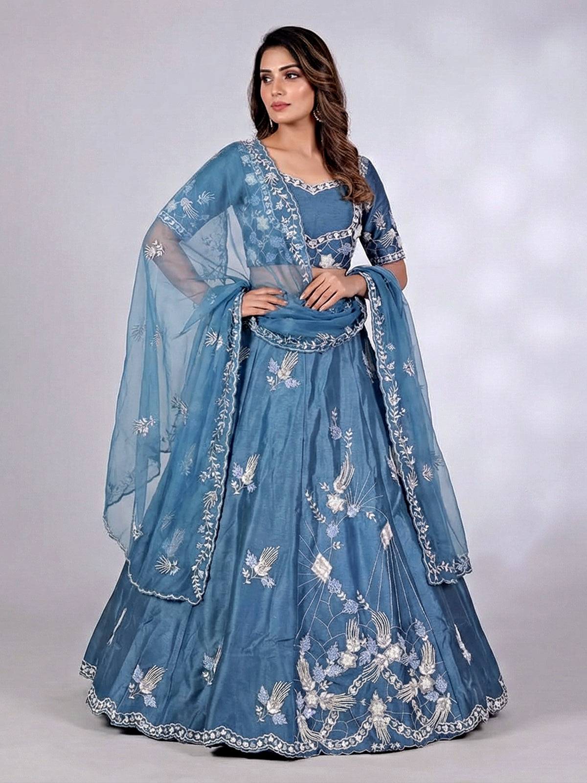 Blue silk lehenga choli with zardosi and beads work