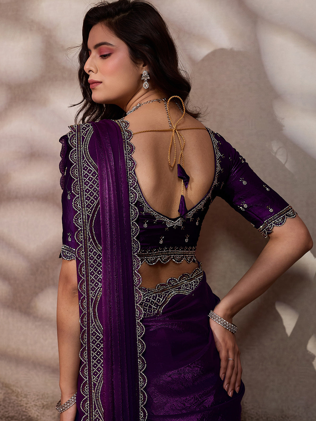 Purple stone worked satin silk saree for party wear